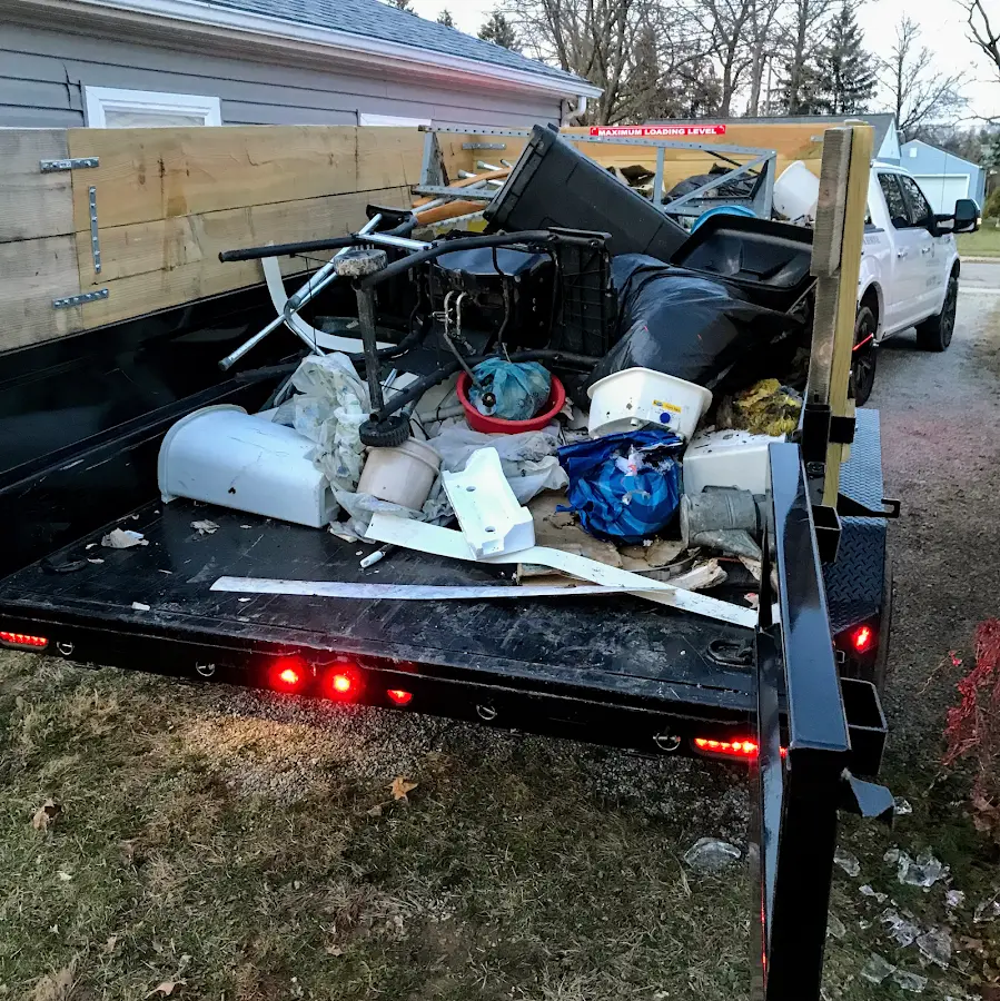 Roll-off dumpster delivered to a residential driveway in River Park